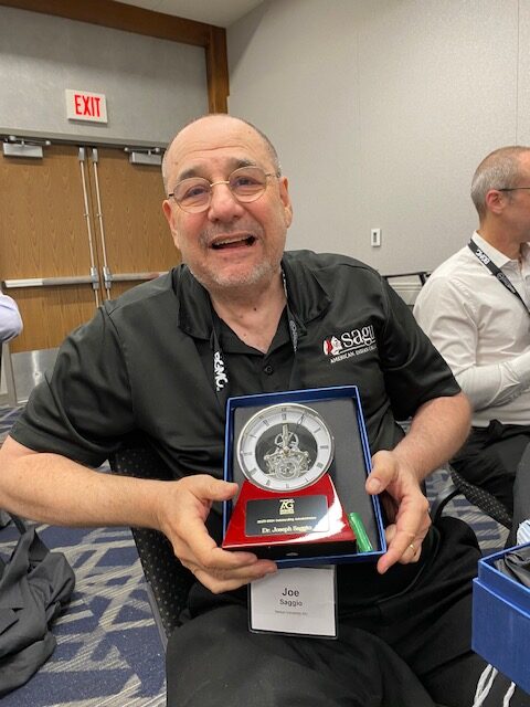 Dr. Saggio with His Award